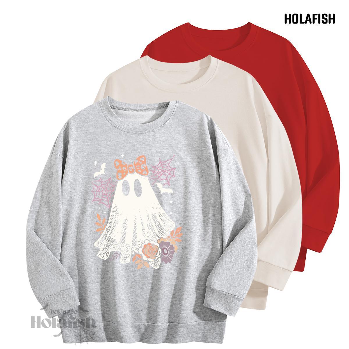 Holafish Graphic Crewneck Sweatshirt, Ghost Lace Bow, gray front with beige and red garments behind.
