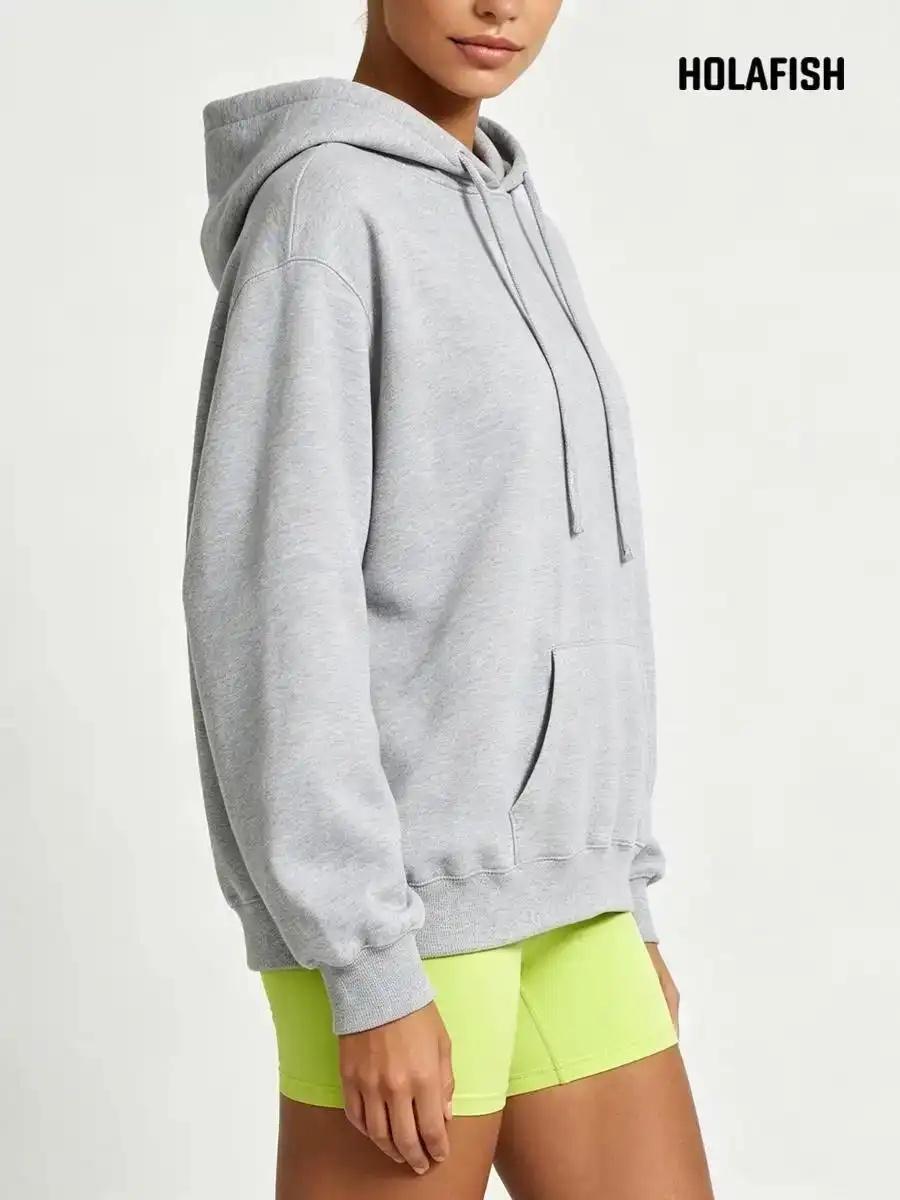 Holafish Fleece Hoodie, No Print, Light Gray, model three-quarter front view.